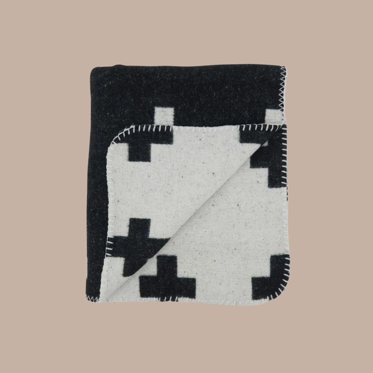 Cozy Plus Sign Reversible Throw with Leather Patch